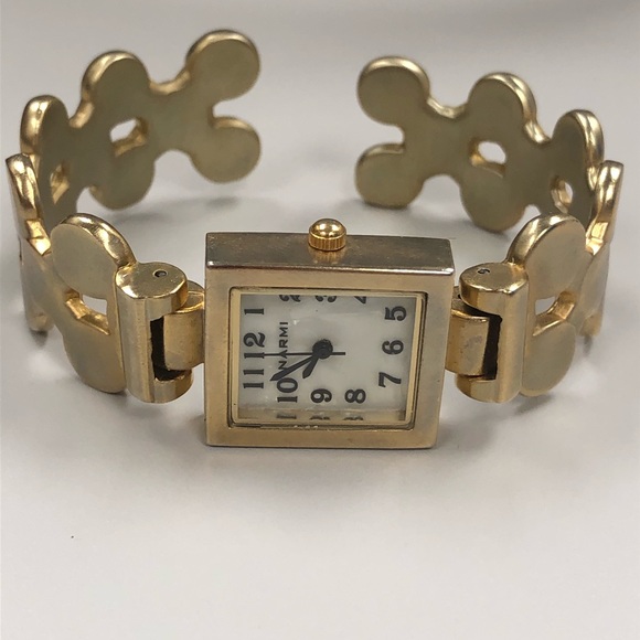 Brushed gold tone puzzle piece cuff bracelet - Picture 1 of 5